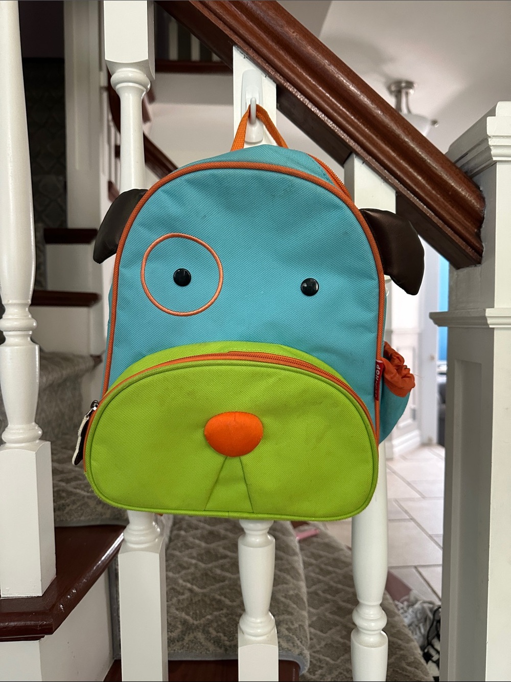 Skip Hop Aqua and Lime Puppy Backpack with Orange Accents
